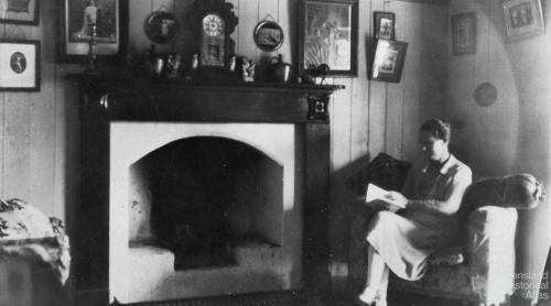 Reading a book, Nanango, 1923