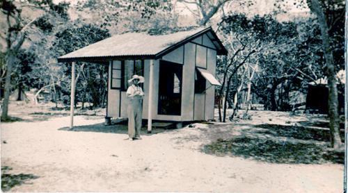 Elizabeth Coombs outside cabin on Hayman Island, 1938