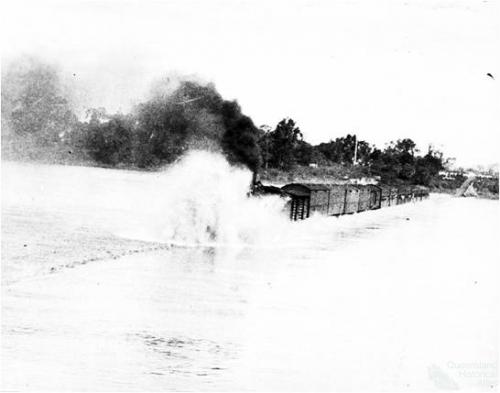 The Townsville Mail through floodwaters on the Burdekin Bridge, 1936