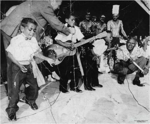 Cherbourg musician Angus Rabbitt (left) and others performing