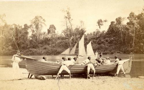 Native Troopers and boat, Lower Herbert River, early 1870s