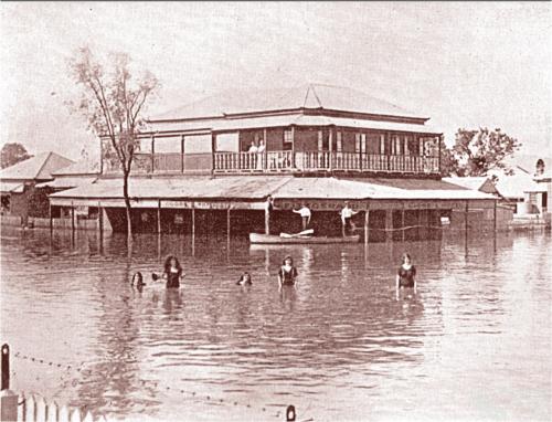 Swimming outside the Globe Hotel, Rockhampton, 1918