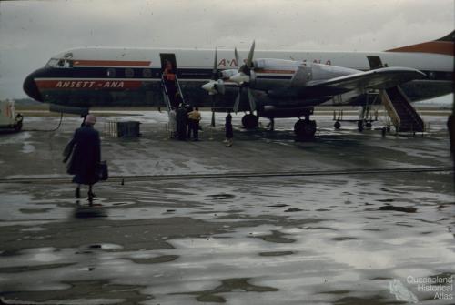 Ansett-ANA Electra aircraft at airport, Eagle Farm, 1960