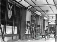 Repairing broken windows, American canteen, Brisbane 1942