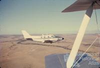 Royal Flying Doctor over Cuddpan Station, Diamantina Shire, 1974