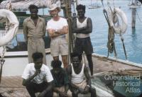 Pearling lugger with skipper and crew, Thursday Island, 1958