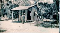 Elizabeth Coombs outside cabin on Hayman Island, 1938