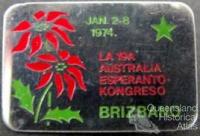 Brisbane badges which include poinsettia motif, 1930-60