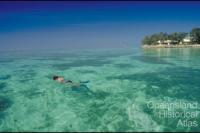 A snorkeller views the shallow corals at Heron Island, 1997 