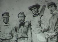 Tommy Wills (right) with cricketing colleagues, 1864