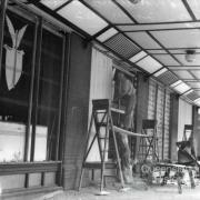 Repairing broken windows, American canteen, Brisbane 1942