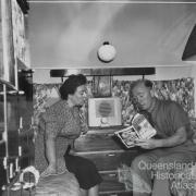 Reading a magazine, 1950