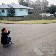 Boy on scooter, Cherbourg, 2010