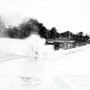 The Townsville Mail through floodwaters on the Burdekin Bridge, 1936