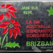 Brisbane badges which include poinsettia motif, 1930-60