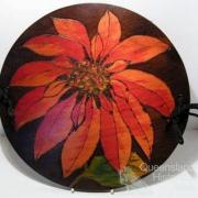 Poinsettia, poker-work decorated doyley press 