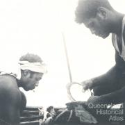 Cleaning pearl shell, c1950