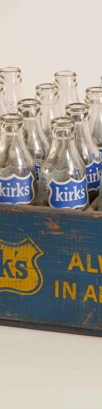 Crate of Kirk's softdrink bottles